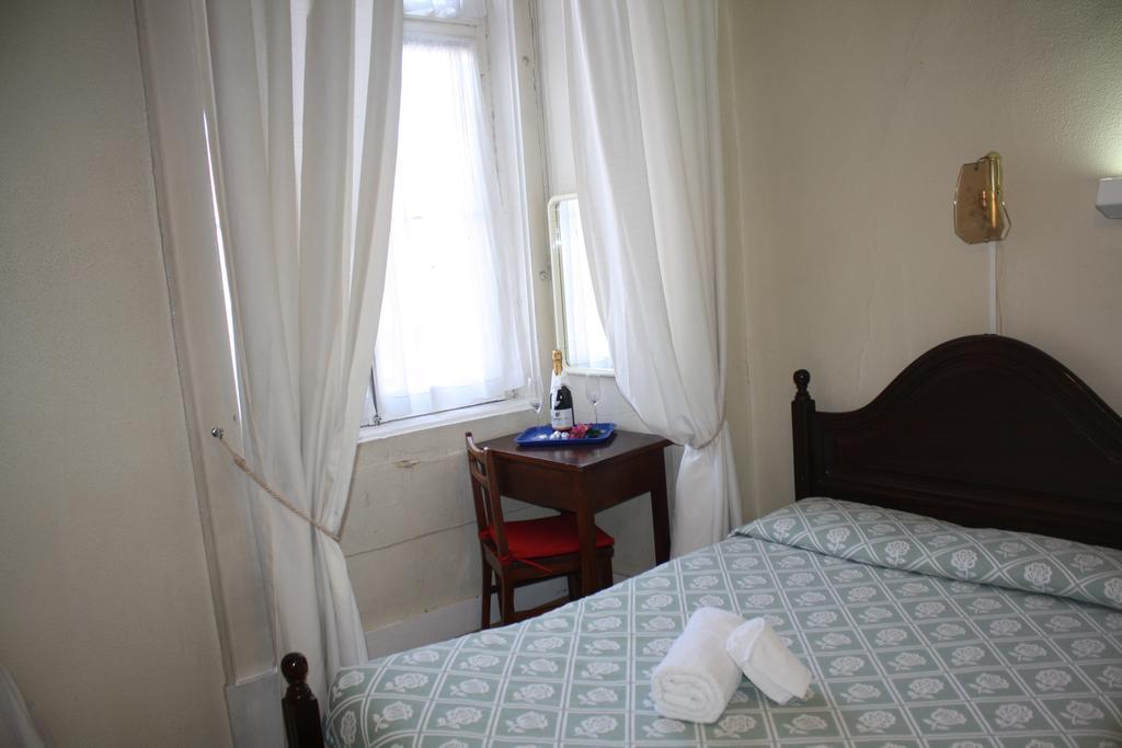Pensao Residencial Estrela Do Mondego Hotel Lisbon Room photo